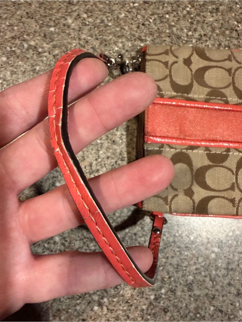 Coach Signature Monogram Wristlet in Brown and Coral